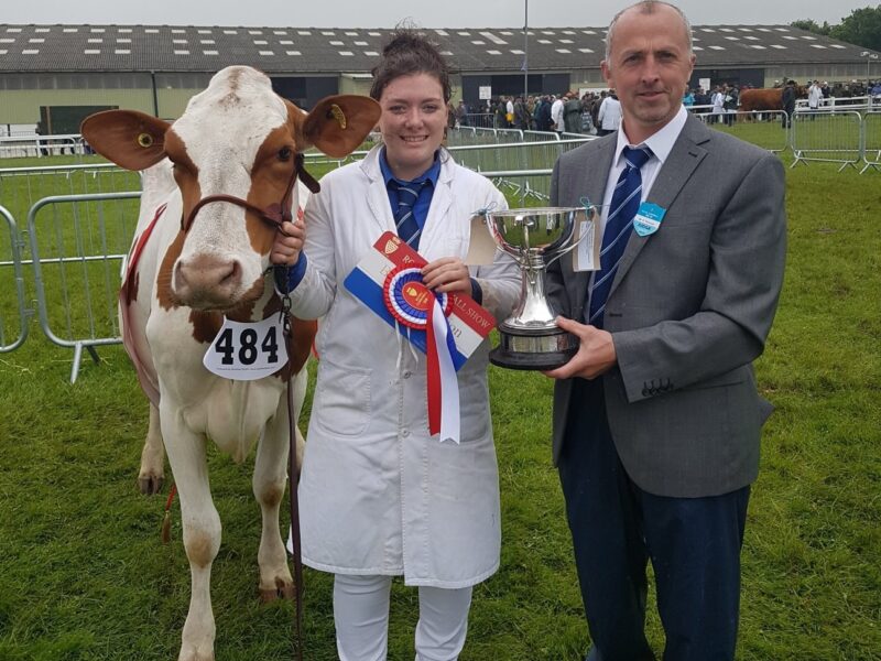 Becky Walters and her Champion Reids Crimson Tulip with Judge Geraint Thomas