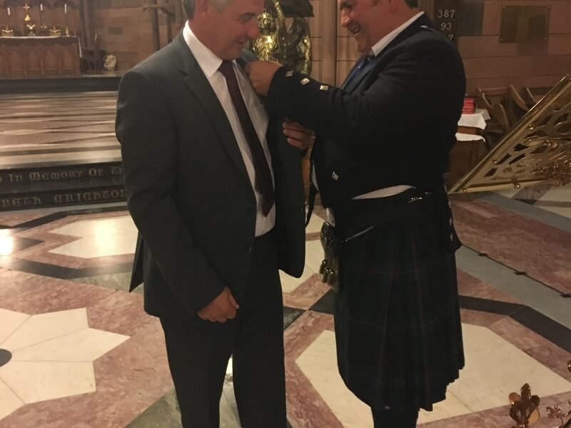 Keith Davidson hands over the Presidents badge to Michael Howie