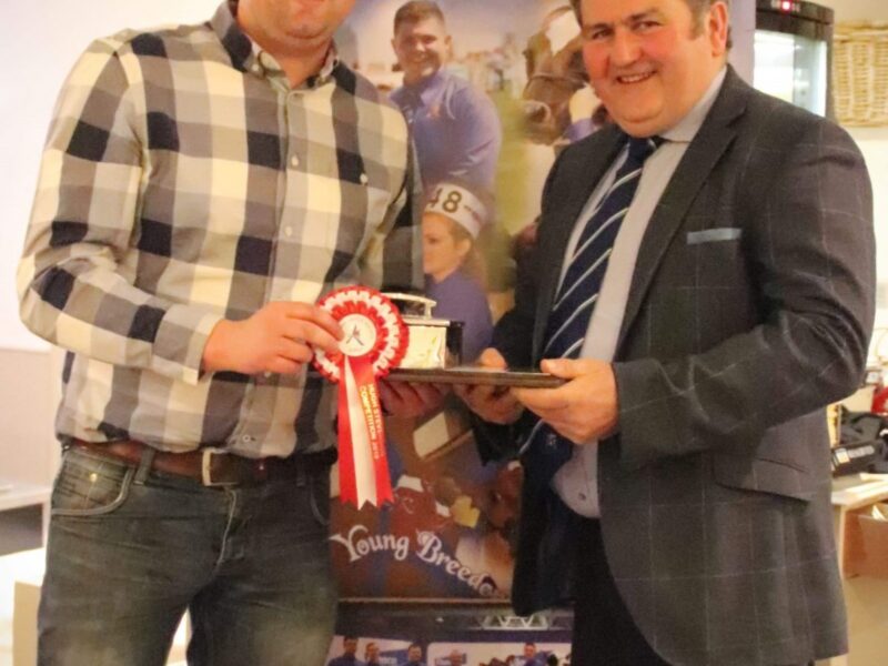 Stockjudging and Sire Selection senior winner Asher Bradley Seddon with Society President Keith Davidson