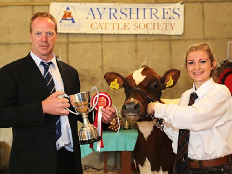 Champion handler, and winner of the mature showmanship class was Sarah Jones, Ballymena. Presenting the trophy is judge Peter Berresford. Picture by Jane Steel.
