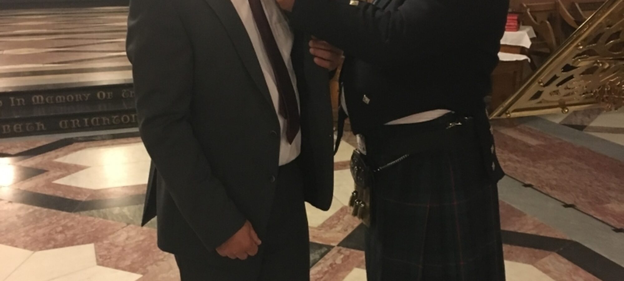 Keith Davidson hands over the Presidents badge to Michael Howie