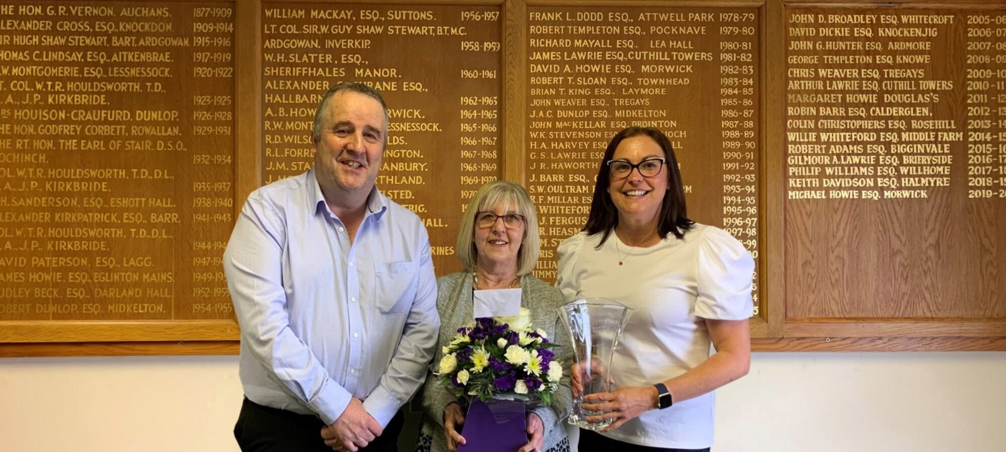 Gilmour Lawrie, Business Coordinator and Claire Kimm, General Manager present Lesley with her retirement gifts.
