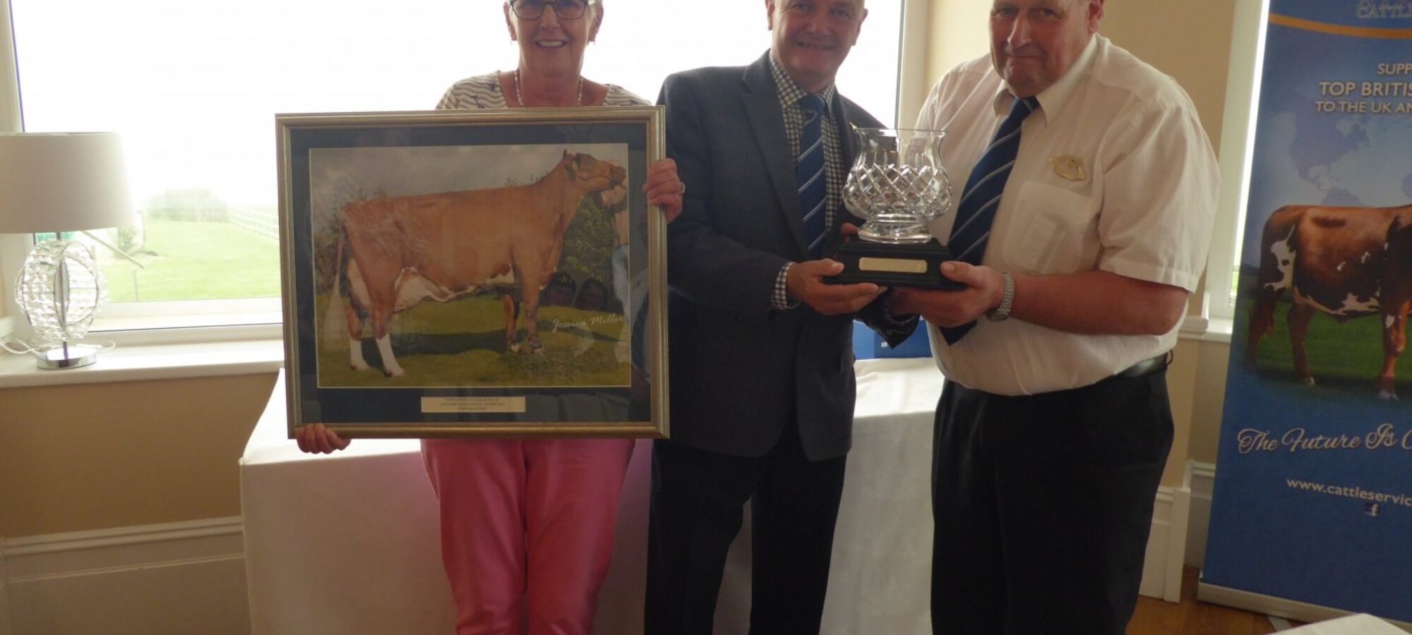 John Broadley and his wife Barbara being presented by Philip Williams with a lifetime achievement award