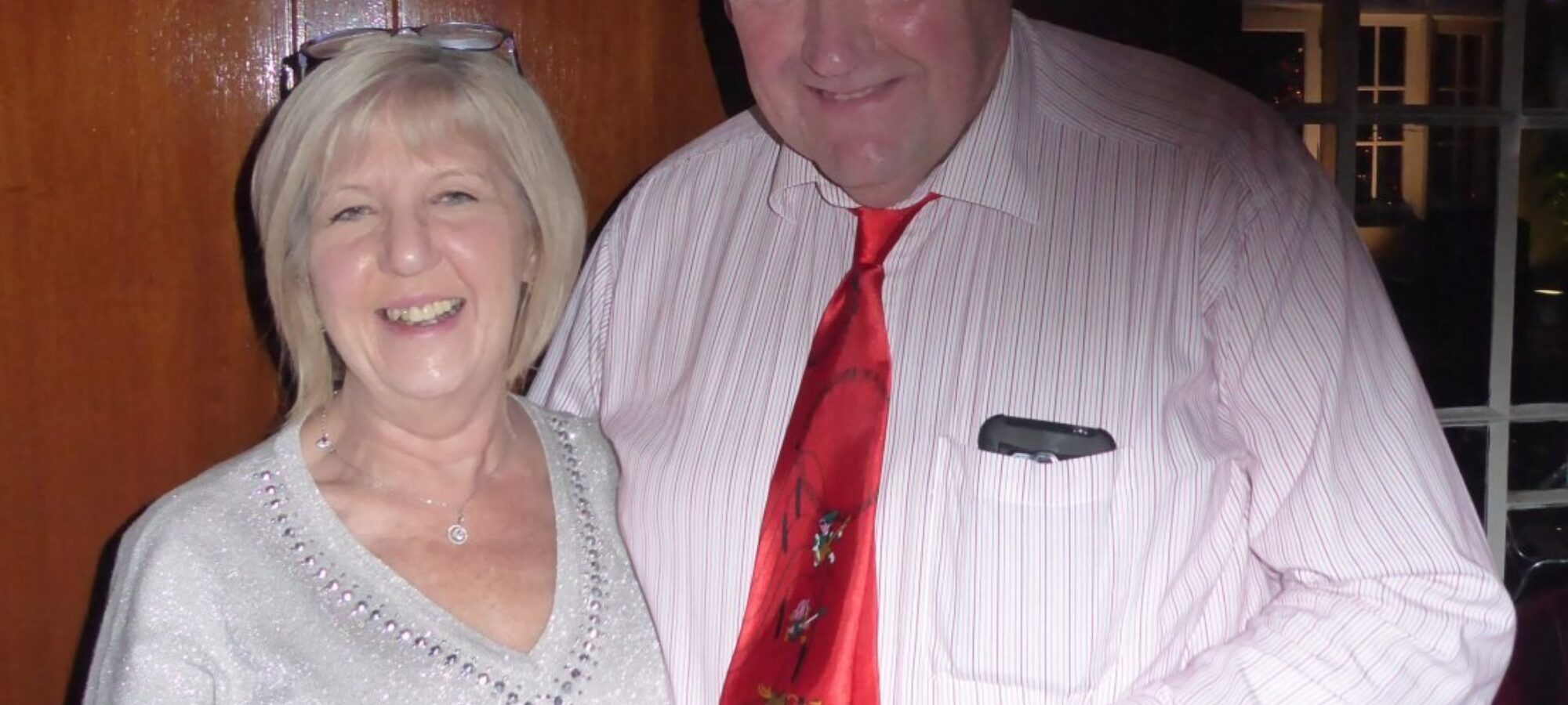President Philip Williams presenting Lesley with a gift to recognise her service.