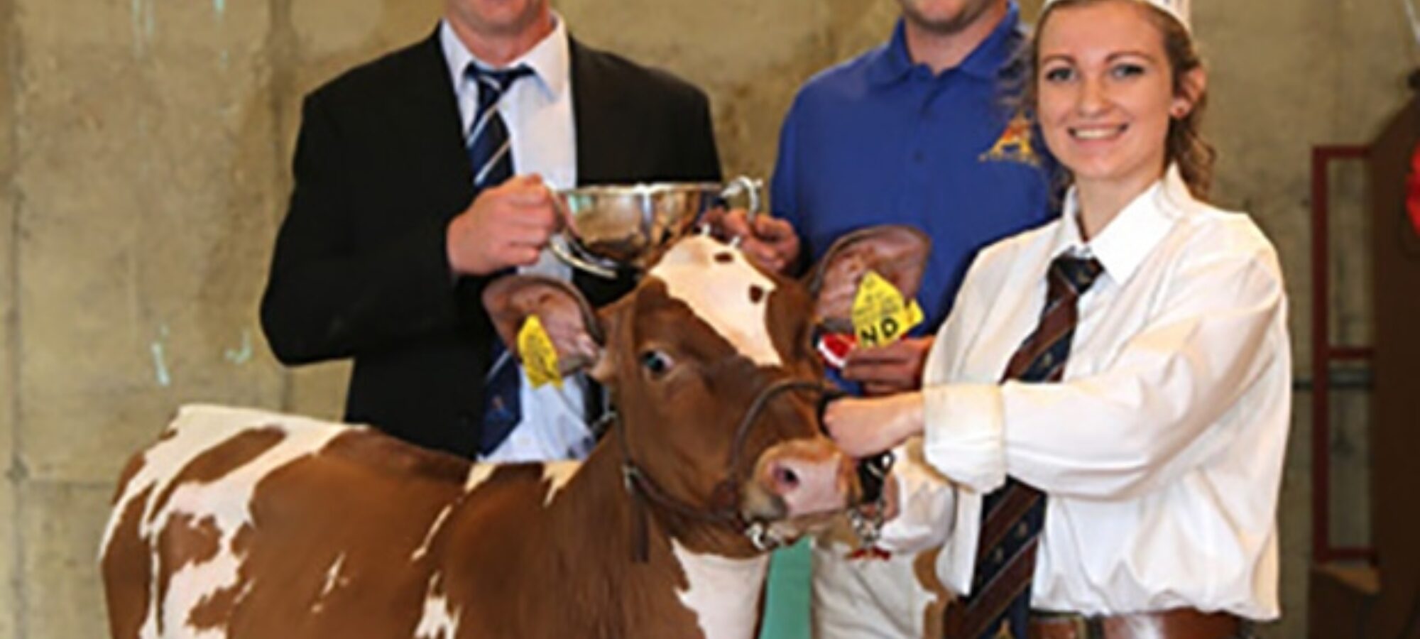Pictured above: Supreme champion - Ardmore Orphan 117 owned by Michael Hunter, and shown by Sarah Jones. Presenting the trophy is Peter Berresford. Picture by Jane Steel.