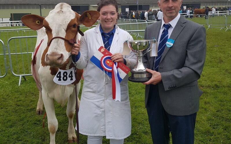 Becky Walters and her Champion Reids Crimson Tulip with Judge Geraint Thomas