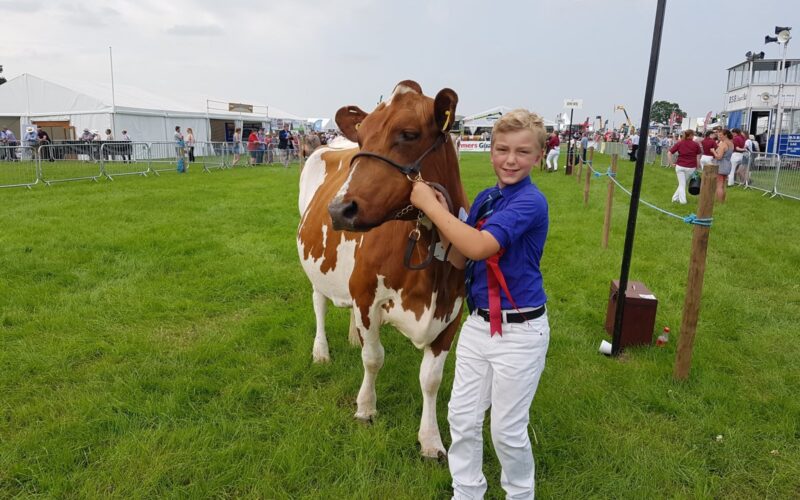 George Oultram leading the Reserve Champion Stamford Shy Girl 18