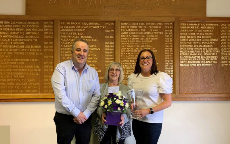 Gilmour Lawrie, Business Coordinator and Claire Kimm, General Manager present Lesley with her retirement gifts.