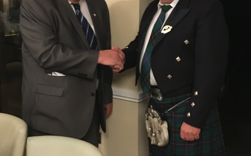 L to R Past President Philip Williams congratulates the new President Keith Davidson
