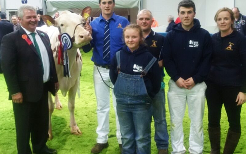Judge - Selwyn Donald (left) with the Keenan family and their champion Ayrshire